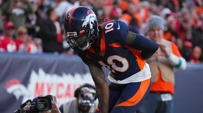 Dec 11, 2022; Denver, Colorado, USA; Denver Broncos wide receiver Jerry Jeudy (10) celebrates his touchdown in the second quarter against the Kansas City Chiefs at Empower Field at Mile High.
